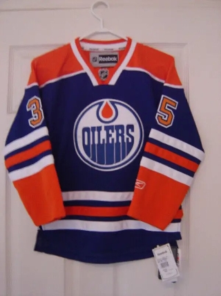 YES BRAND NEW WITH TAGS 2 OILERS YOUTH JERSEYS ALL STITCHED!