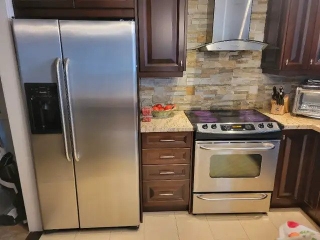 EXCELLENT CONDITION! S/S MATCHING “GE” FRIDGE AND STOVE